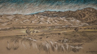a photo of a pleinair drawing of the Great Sand Dunes by Jonathan Machen, 2021